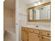 Bright bathroom with vanity, sink, and bathtub at 618 Bird Bay S Dr # 206, Venice, FL 34285