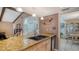 Kitchen with granite countertops and double sink at 6556 Waterford Cir, Sarasota, FL 34238