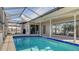 Enclosed pool and patio area with access to the house at 6556 Waterford Cir, Sarasota, FL 34238