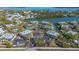 Aerial view of waterfront community with canal access at 6750 Gulf Of Mexico Dr # 153, Longboat Key, FL 34228