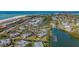 Aerial view of community near the waterfront with a canal at 6750 Gulf Of Mexico Dr # 153, Longboat Key, FL 34228