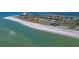 Aerial view of beachfront community with tennis courts at 6750 Gulf Of Mexico Dr # 153, Longboat Key, FL 34228