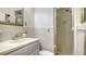 Clean bathroom with shower stall and updated vanity at 6750 Gulf Of Mexico Dr # 153, Longboat Key, FL 34228