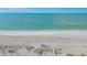 Expansive beach view with white sand and turquoise water at 6750 Gulf Of Mexico Dr # 153, Longboat Key, FL 34228