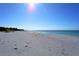 Scenic beach with white sand and ocean view at 6750 Gulf Of Mexico Dr # 153, Longboat Key, FL 34228