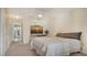 Bedroom with queen bed, large closet and TV at 6750 Gulf Of Mexico Dr # 153, Longboat Key, FL 34228