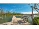 Community fishing dock with cleaning station at 6750 Gulf Of Mexico Dr # 153, Longboat Key, FL 34228