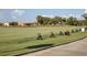 Driving range with multiple hitting stations and lush landscaping at 6819 Grand Estuary Trl # 102, Bradenton, FL 34212