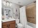 Guest bathroom with tub, shower, and vanity at 6819 Grand Estuary Trl # 102, Bradenton, FL 34212