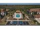 Community pool with ample lounge chairs and gazebo at 6819 Grand Estuary Trl # 102, Bradenton, FL 34212