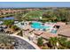 Resort-style pool with surrounding lounge area at 6819 Grand Estuary Trl # 102, Bradenton, FL 34212