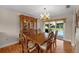 Formal dining room with wood furniture and access to the pool area at 7510 16Th Nw Ave, Bradenton, FL 34209