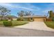 House with a circular driveway and nicely landscaped yard at 7510 16Th Nw Ave, Bradenton, FL 34209