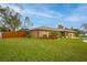 Well-maintained lawn with landscaping and wood fence at 7510 16Th Nw Ave, Bradenton, FL 34209