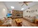 Living room features a stone fireplace and hardwood floors at 7510 16Th Nw Ave, Bradenton, FL 34209