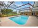 Refreshing screened-in pool and lush landscaping at 7510 16Th Nw Ave, Bradenton, FL 34209