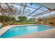 Beautiful screened pool with lush landscaping at 7510 16Th Nw Ave, Bradenton, FL 34209