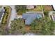 Single story home with pool, viewed from above at 7664 39Th Street E Cir, Sarasota, FL 34243