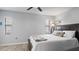 Spacious bedroom with large bed and neutral decor at 7664 39Th Street E Cir, Sarasota, FL 34243