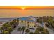 Beachfront home with pool and ocean views at sunset at 777 N Manasota Key Rd, Englewood, FL 34223