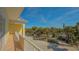 Balcony with view of lush tropical landscape at 777 N Manasota Key Rd, Englewood, FL 34223