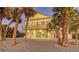 Beachfront home with palm trees and ocean views at 777 N Manasota Key Rd, Englewood, FL 34223