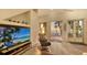 Bright living room with ocean view and comfy seating at 777 N Manasota Key Rd, Englewood, FL 34223