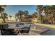 Relaxing poolside patio furniture with ocean views at 777 N Manasota Key Rd, Englewood, FL 34223