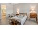 Cozy bedroom with ensuite bathroom and ample light at 8043 Waterbend Trl, Sarasota, FL 34240