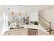 Modern white kitchen with stainless steel appliances at 8612 Evening Dr, Sarasota, FL 34241