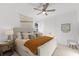 Comfortable guest bedroom featuring a king-size bed and calming decor at 883 Seascape Pl, Sarasota, FL 34240