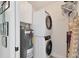 Convenient laundry room with washer, dryer, and extra storage at 8901 Veranda Way # 116, Sarasota, FL 34238