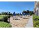 Large outdoor patio with multiple tables at 8901 Veranda Way # 116, Sarasota, FL 34238