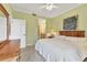 Bright bedroom with king-size bed and built-in dresser at 9620 Club South Cir # 5102, Sarasota, FL 34238