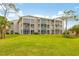 Two story building with balconies and green space at 9620 Club South Cir # 5102, Sarasota, FL 34238