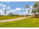 Golf cart path winds through green fairways at 9620 Club South Cir # 5102, Sarasota, FL 34238