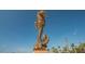 Large seahorse statue against a clear blue sky at 1000 Riverside Dr # B103, Palmetto, FL 34221