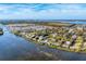 Aerial view of waterfront community with homes and canals at 10106 46Th W Ave, Bradenton, FL 34210