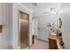 Bathroom with shower and wood vanity at 10106 46Th W Ave, Bradenton, FL 34210