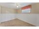 Simple bedroom with tile floors and wainscoting at 10106 46Th W Ave, Bradenton, FL 34210