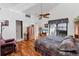 Main bedroom with water views, hardwood floors, and a ceiling fan at 10106 46Th W Ave, Bradenton, FL 34210