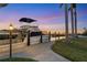Sunset view of boat docked at waterfront property at 10106 46Th W Ave, Bradenton, FL 34210