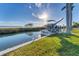 Private boat dock with covered slip and direct water access at 10106 46Th W Ave, Bradenton, FL 34210