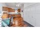 Craft room with wood cabinets, sink, and hardwood floors at 10106 46Th W Ave, Bradenton, FL 34210