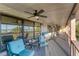 Long deck with water views and comfortable seating area at 10106 46Th W Ave, Bradenton, FL 34210