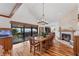 Dining room featuring hardwood floors, large chandelier, and water views at 10106 46Th W Ave, Bradenton, FL 34210