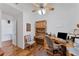 Bright home office features built-in wooden desk and cabinets at 10106 46Th W Ave, Bradenton, FL 34210