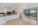 Kitchen with granite countertops and water view at 10106 46Th W Ave, Bradenton, FL 34210