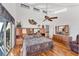 Spacious main bedroom with water views and built-in wooden furniture at 10106 46Th W Ave, Bradenton, FL 34210