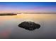 Tranquil waterfront view with bird island at 10106 46Th W Ave, Bradenton, FL 34210